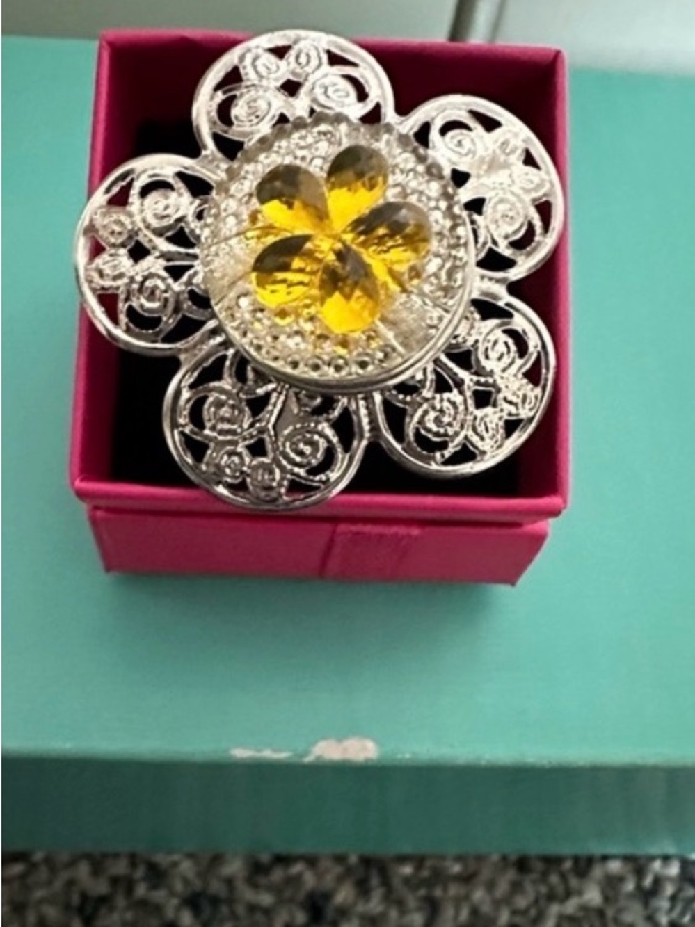 Silver flower ring with yellow stones adjustable { costume jewelry}